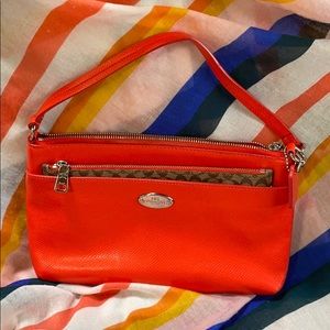 Coach large wristlet w/pocket and signature pouch.
